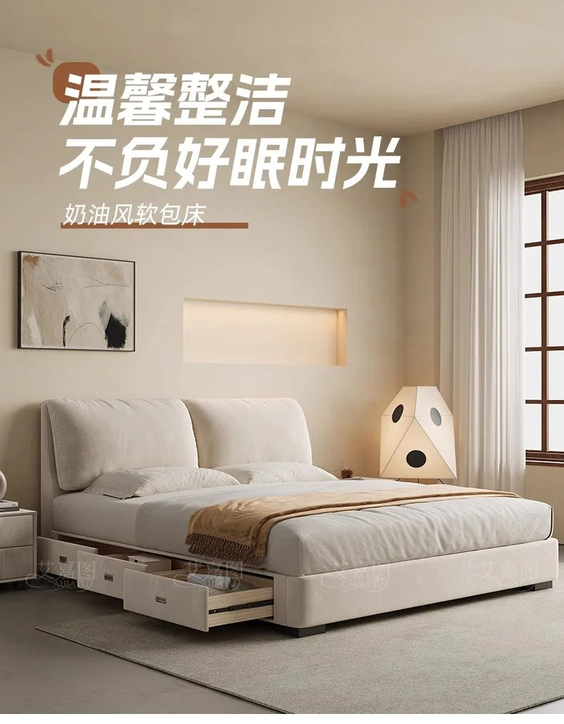 Modern cream 180x200cm storage bed featuring a plush, padded headboard and integrated side drawers in a bright bedroom.
