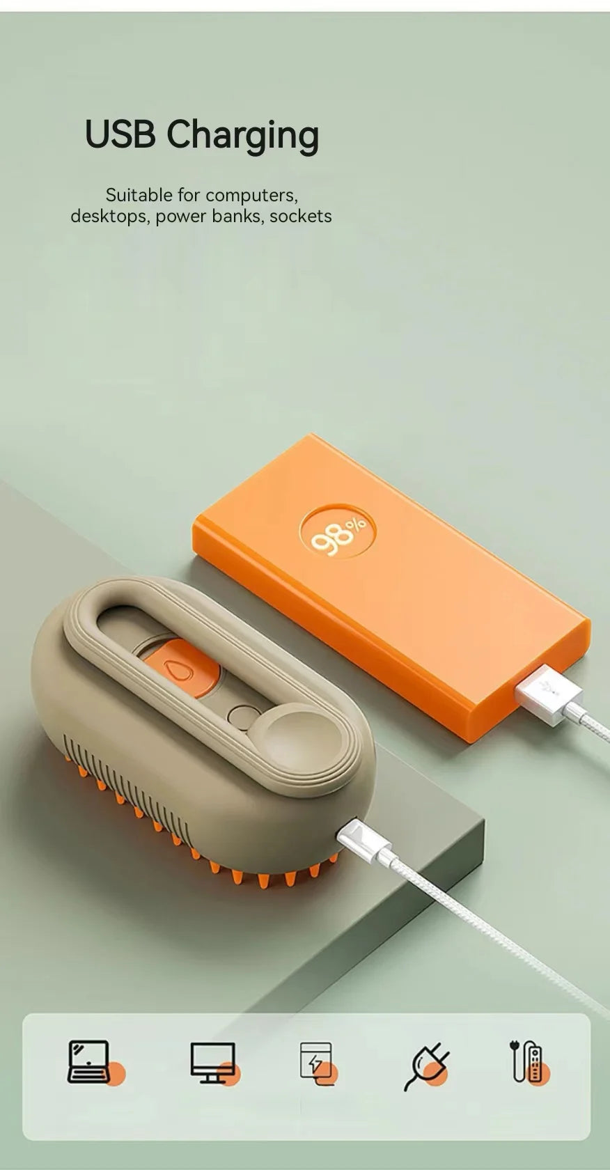 Grey, oval-shaped electric grooming brush with orange bristles, charging via USB from an orange power bank.