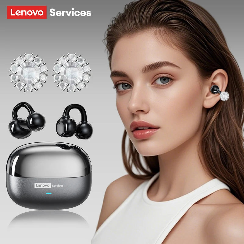 Black ear-clip wireless earbuds with sparkling rhinestone attachments, shown with a metallic grey charging case.