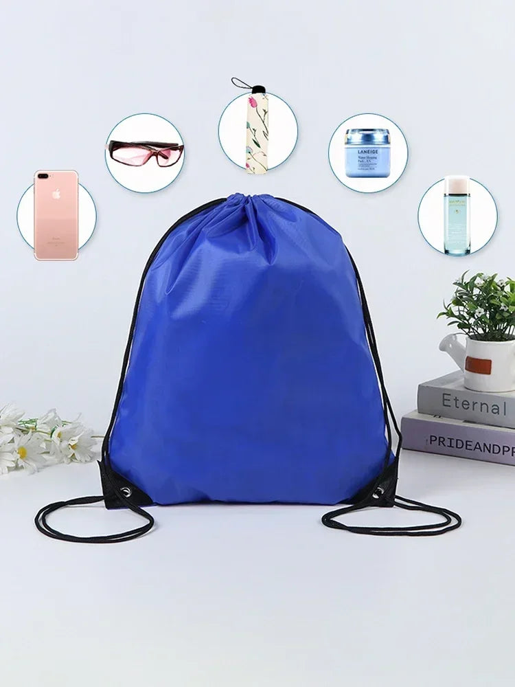 A bright blue drawstring bag surrounded by icons showing items that fit inside, like a phone, umbrella, and cosmetics.