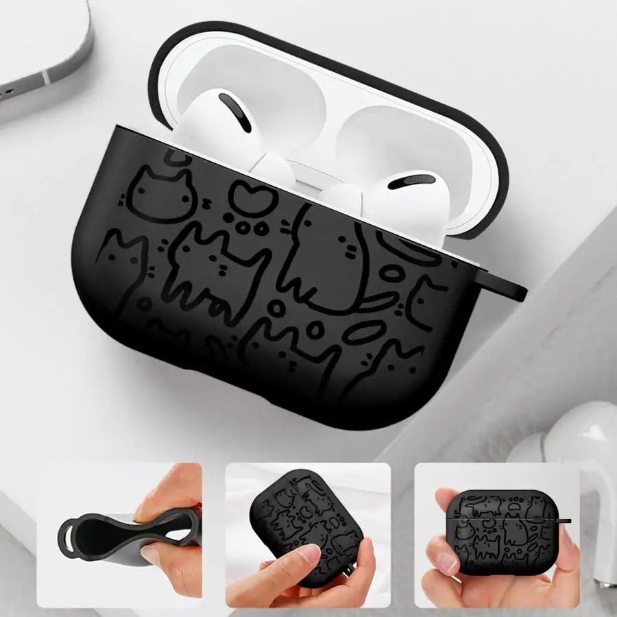 Black silicone AirPods Pro case featuring a white doodle cat pattern. Flexible material with a secure fit.