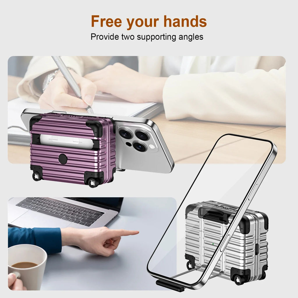 Purple and silver luggage-style hard shell AirPods cases doubling as phone stands, shown in desk setting.