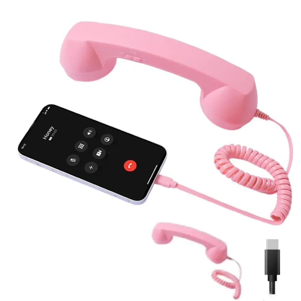 Retro-style pink telephone handset for smartphones, featuring a coiled cord and USB-C plug for wired connectivity.