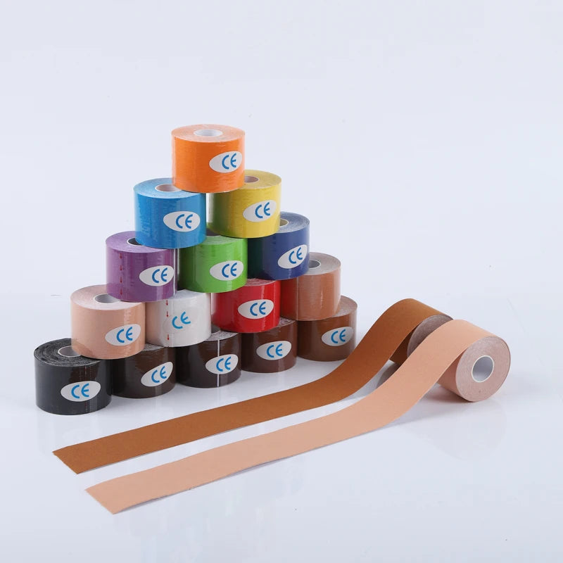A pyramid stack of assorted colourful kinesiology tape rolls, each featuring a blue CE quality certification logo.