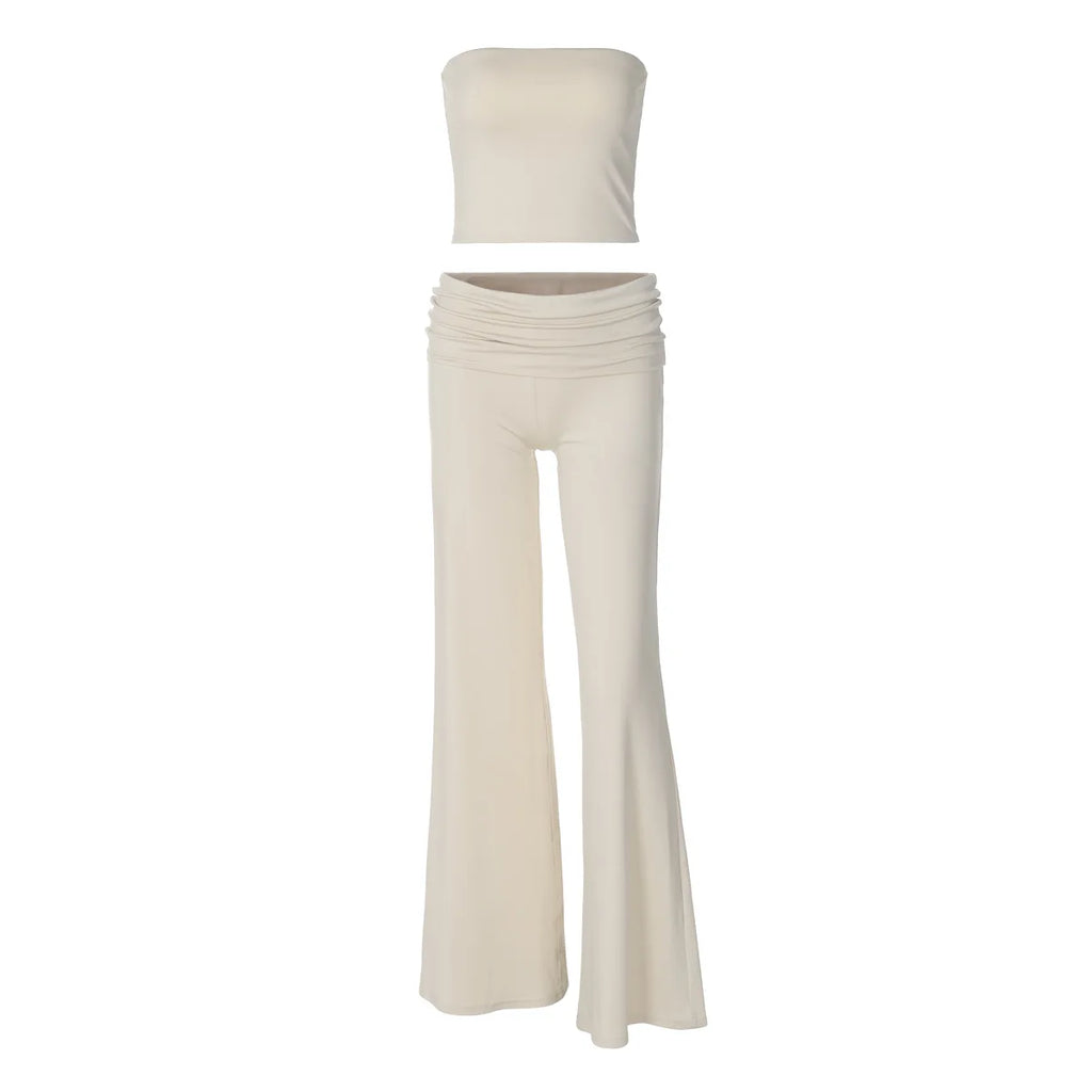 Beige two-piece set featuring a strapless tube top and matching high-waisted flared trousers with a folded waistband.