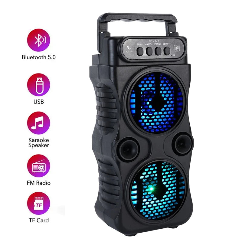 Black portable wireless speaker with a carry handle, dual glowing blue LED speakers, FM radio, and USB/TF card slots.