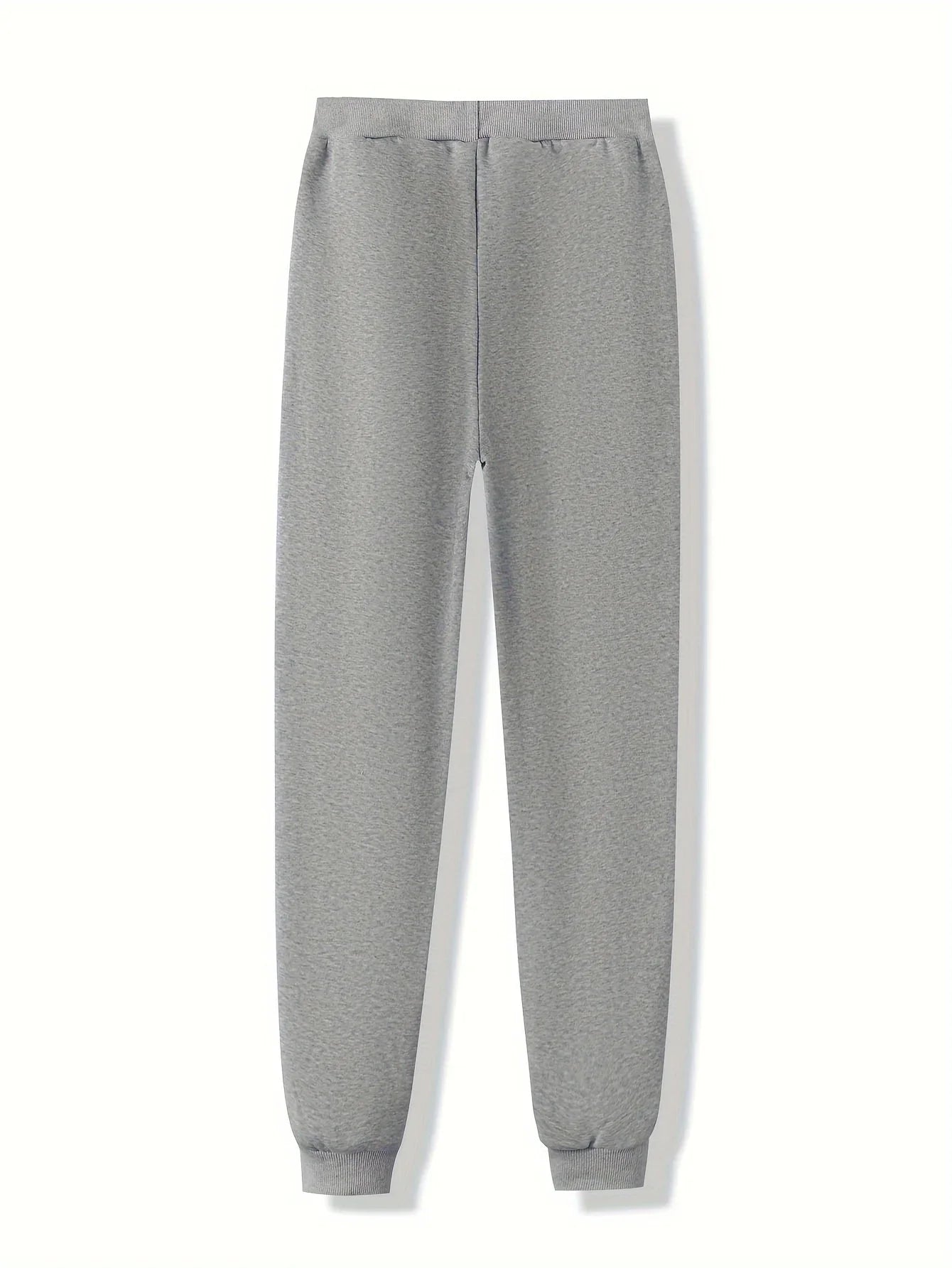 Grey jersey joggers with an elasticated waistband and cuffed ankles, featuring a comfortable, relaxed fit.