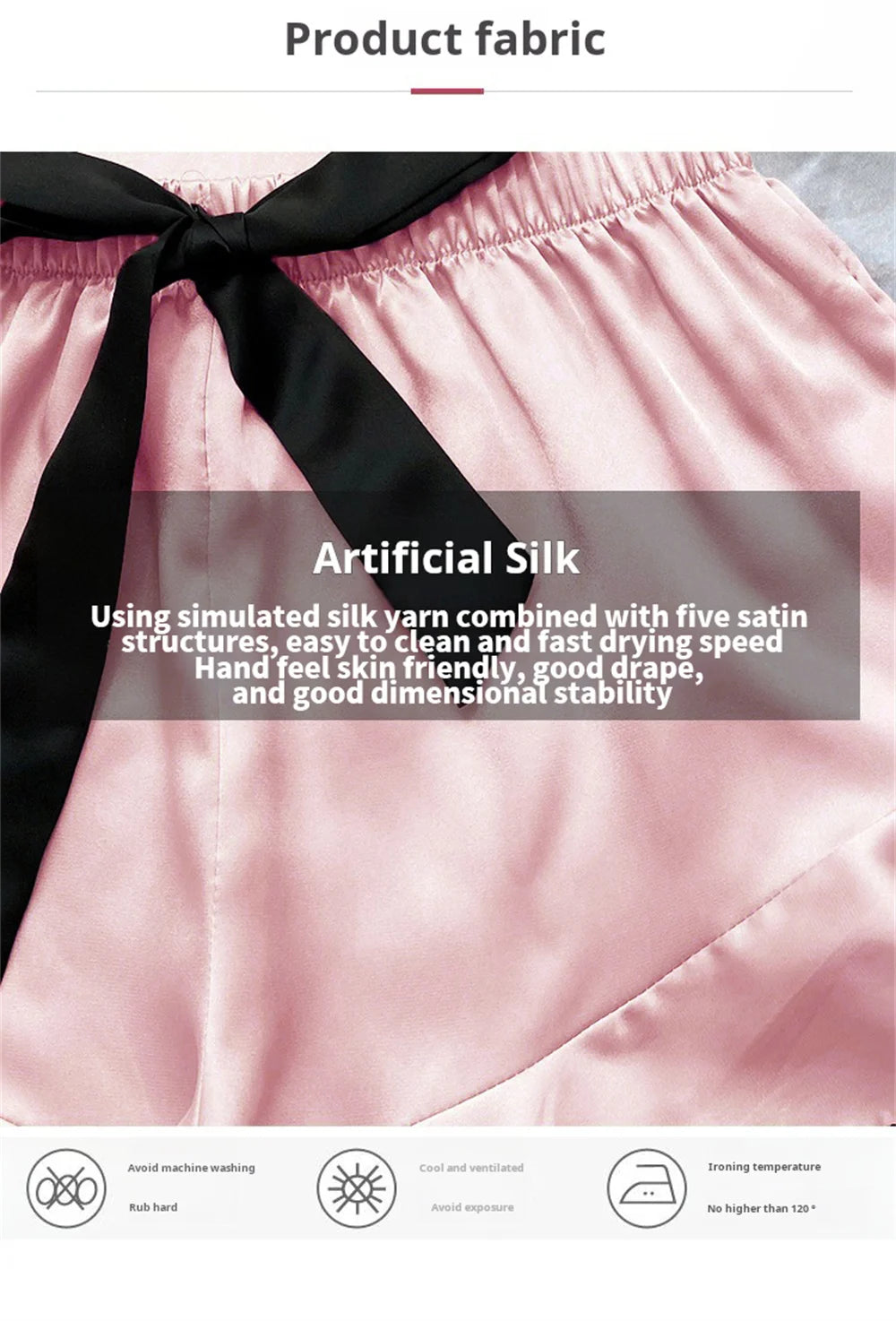 Close-up of pink artificial silk fabric with a black tie-waist detail, showing a soft, drapey texture.