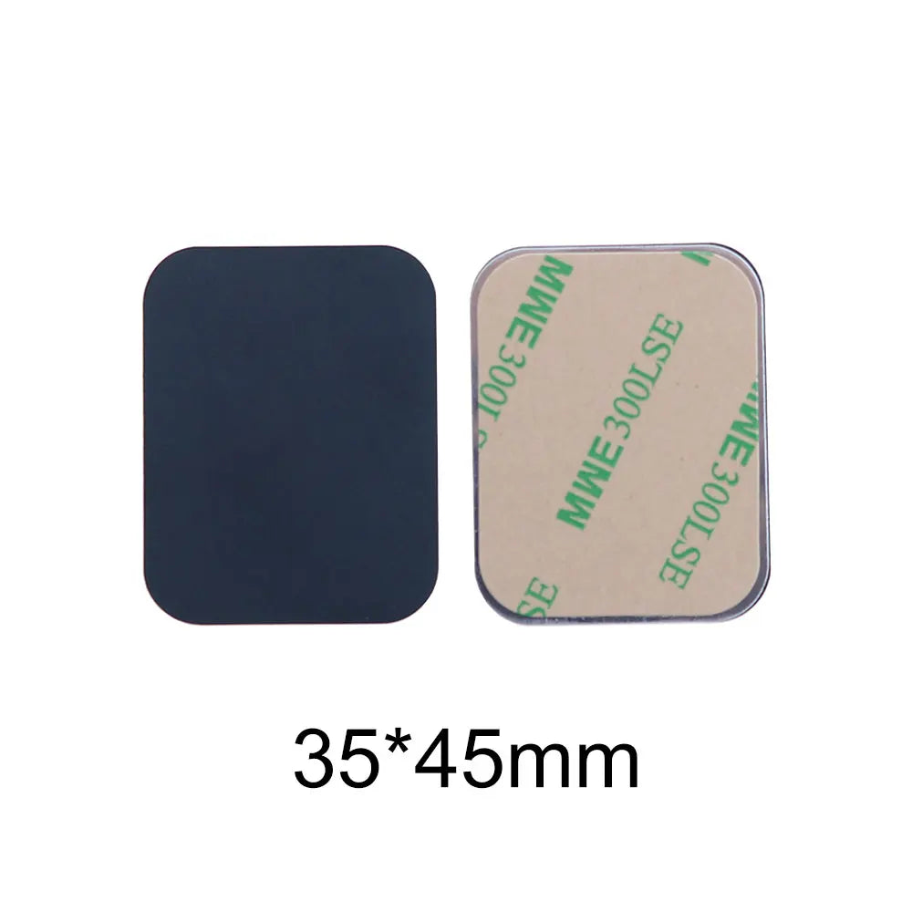 Two rectangular 35x45mm adhesive metal plates with rounded corners: one black, one with a green-printed adhesive backing.