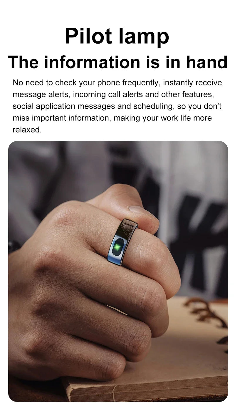 Sleek, dark grey smart ring worn on a finger, featuring a glowing green notification light.