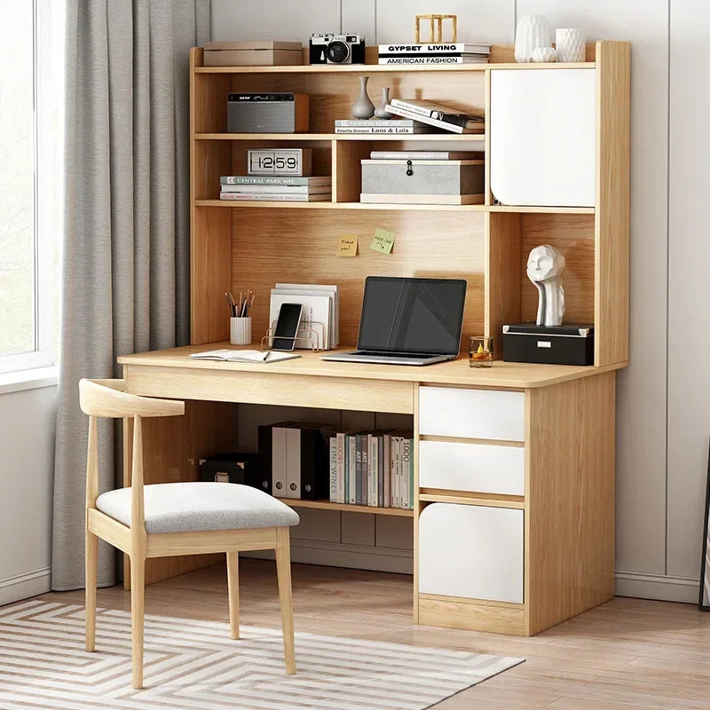 Light wood desk with a hutch, white drawers and cabinet doors, and a matching chair on a rug.