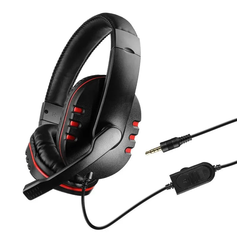 Black wired gaming headset with red accents, padded ear cups, adjustable microphone, and an inline volume control unit.