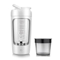 White electric protein shaker bottle with measuring markings and a detachable storage container on a white background.