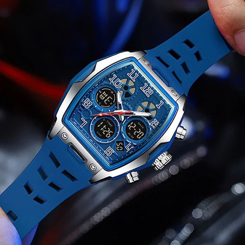 Men's blue dual-display sports watch with a tonneau-shaped silver case, analog hands, digital sub-dials, and silicone band.