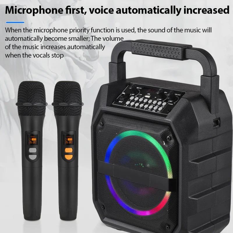 Portable black wireless speaker with handle, colourful LED ring light, and two handheld microphones with digital displays.