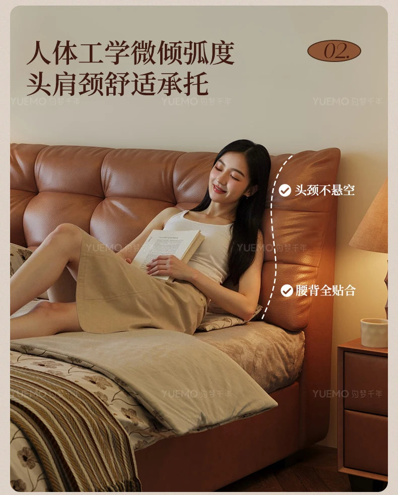 Modern Nordic double bed with a tan, ergonomically curved leather headboard for comfortable back and neck support.