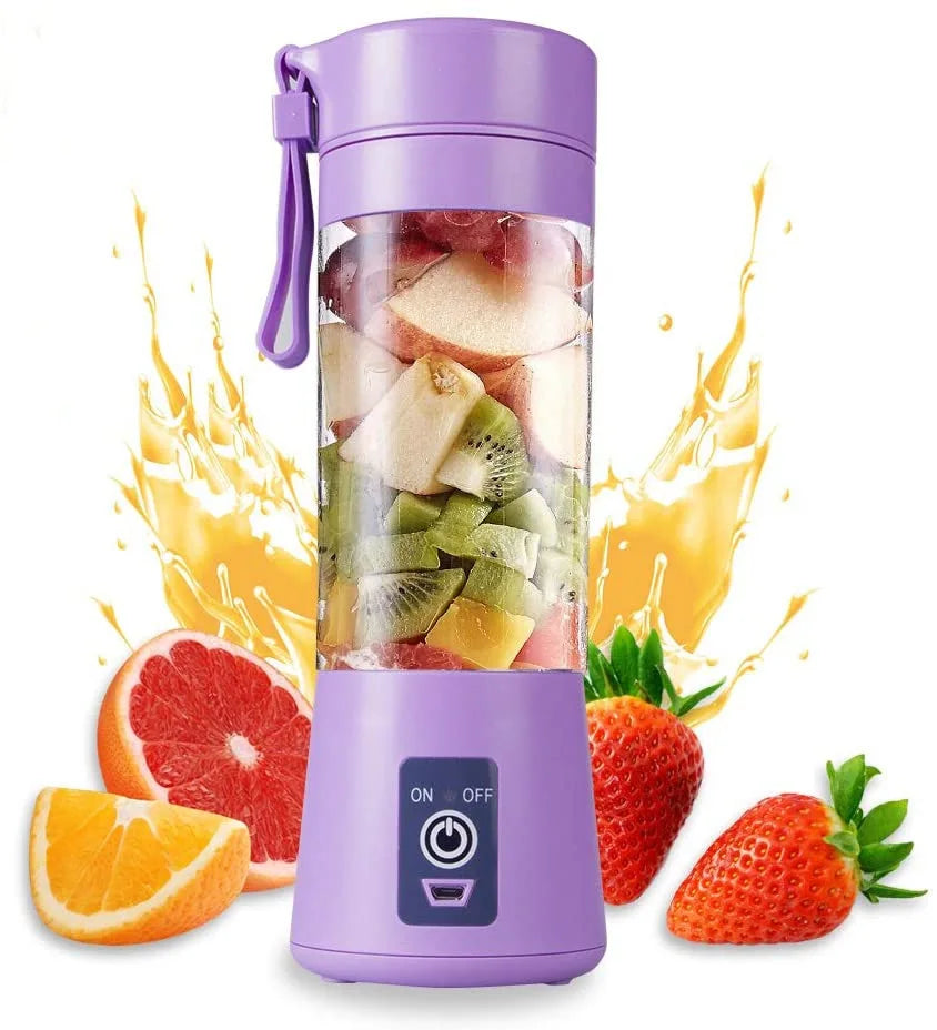Portable purple personal blender filled with chopped fruit, with fruit and juice splashes in the background.