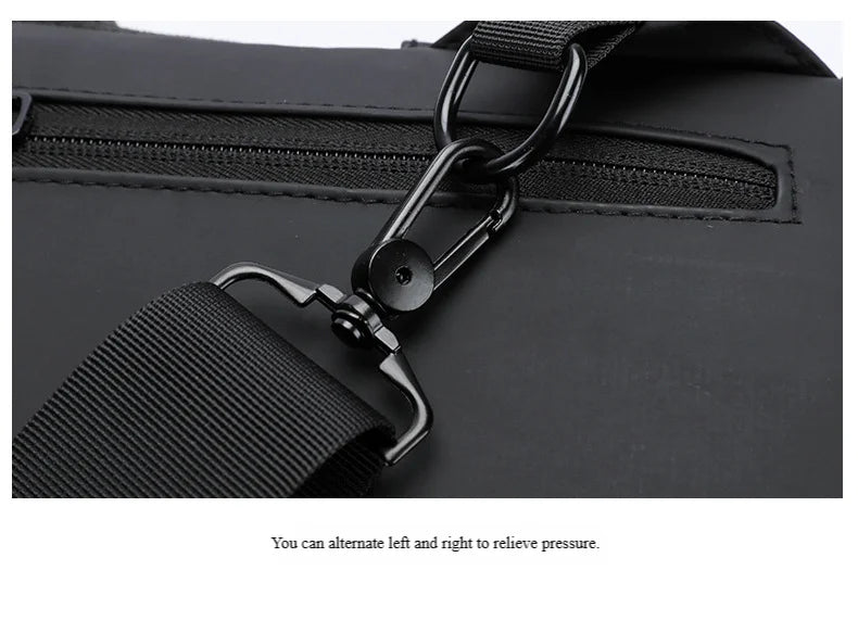 Close-up of a matte black anti-theft chest bag showing a sturdy metal swivel clip on an adjustable shoulder strap.