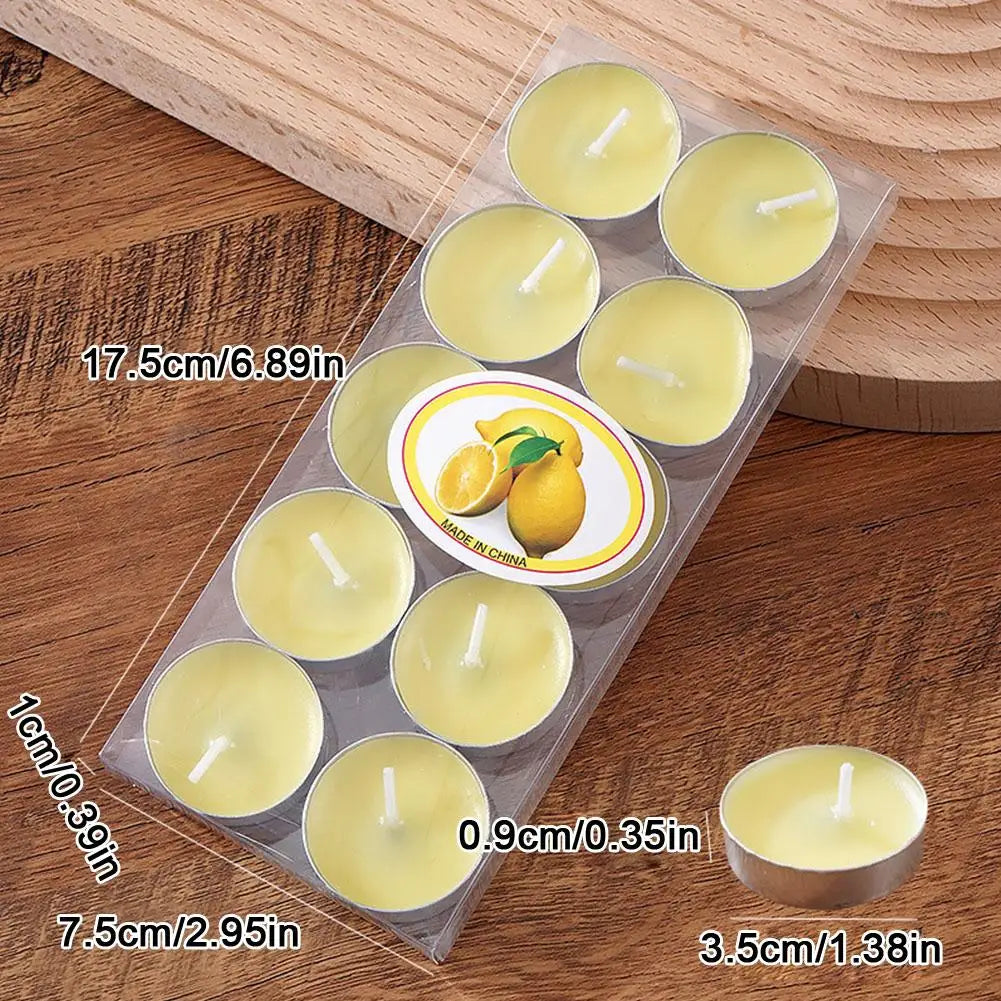 Pack of ten round lemon-scented yellow tea light candles in metal cups on a wooden surface.