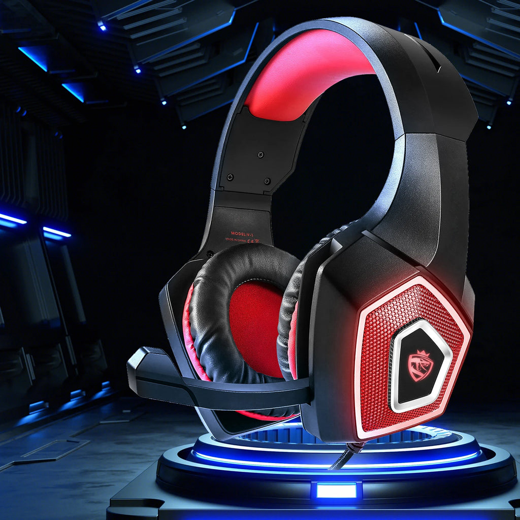 Black and red wired gaming headset with cushioned ear cups, adjustable microphone, and illuminated mesh side panels.
