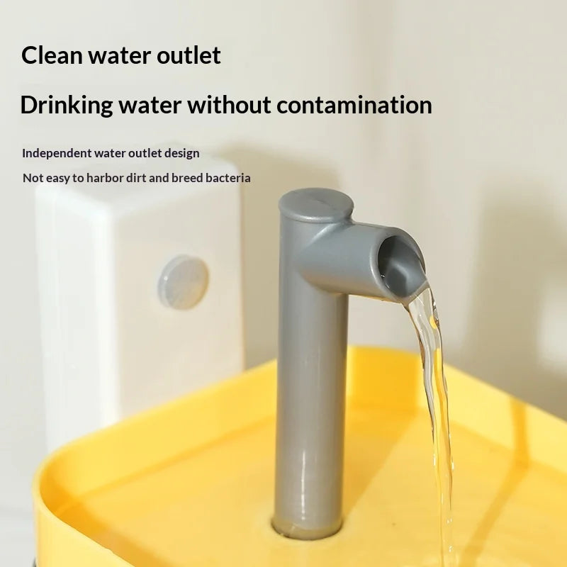 Grey, elevated water spout on a bright yellow, automatic pet water fountain base with a clean, minimalist design.