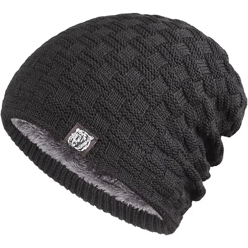 Black knitted beanie hat with a textured pattern and a warm, grey plush lining.