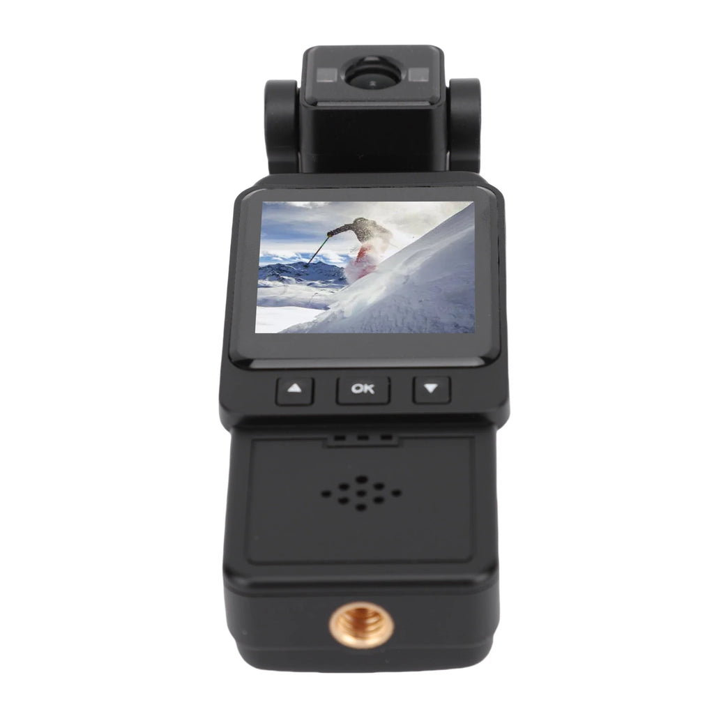 Black plastic dash cam with an LCD screen displaying a skier, navigation buttons, and a bottom tripod mount.