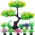 Artificial aquarium plant set featuring a large cherry blossom-style tree and various small, colorful grass clumps.