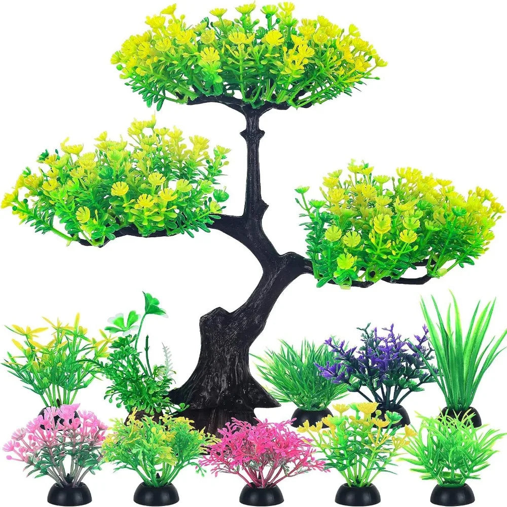 Artificial aquarium plant set featuring a large cherry blossom-style tree and various small, colorful grass clumps.