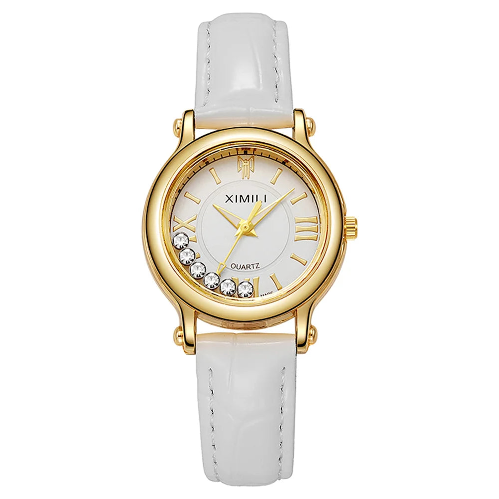 Elegant women’s watch with a white faux-leather strap, gold-tone case and white dial with floating crystal accents.