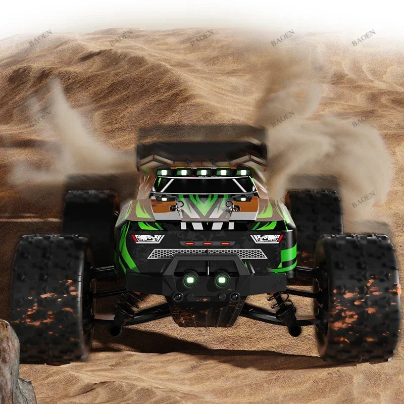 SCY9522PRO 1:16 green and black RC monster truck racing through sand with large treaded tires and glowing headlights.