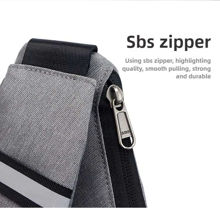 Close-up of a grey, waterproof men's crossbody bag featuring a durable, smooth-pulling metal zip and black trim.
