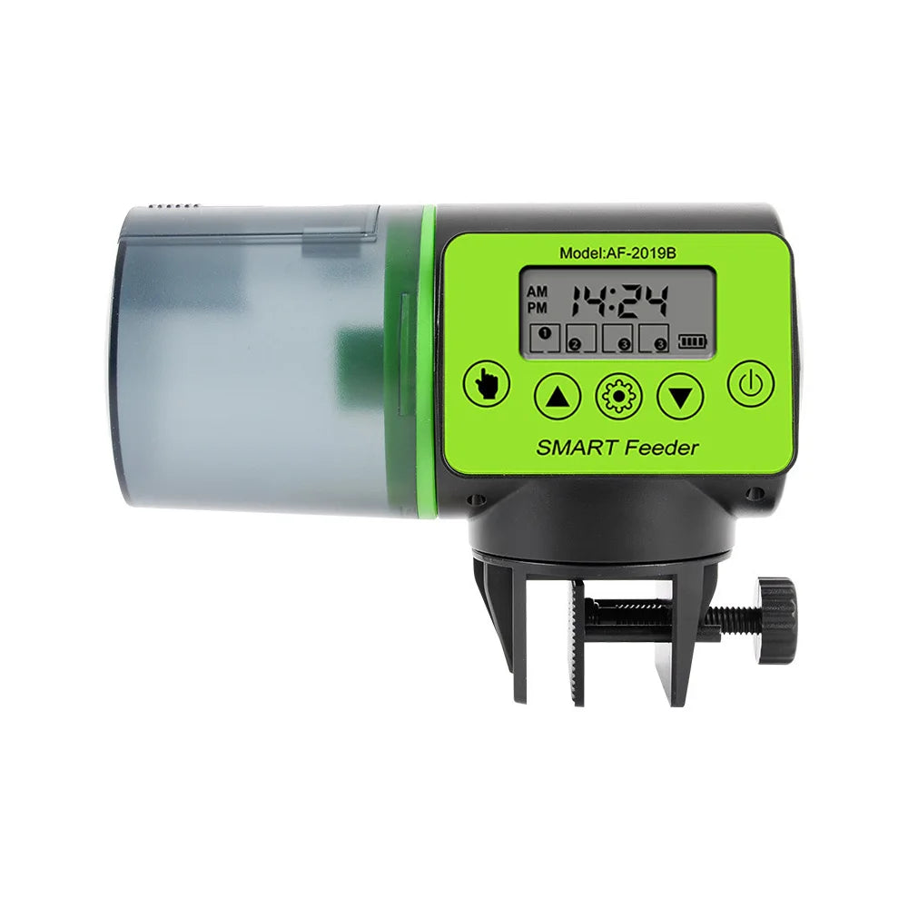 Black and lime green automatic fish feeder with a digital LCD display and mounting clamp on a white background.