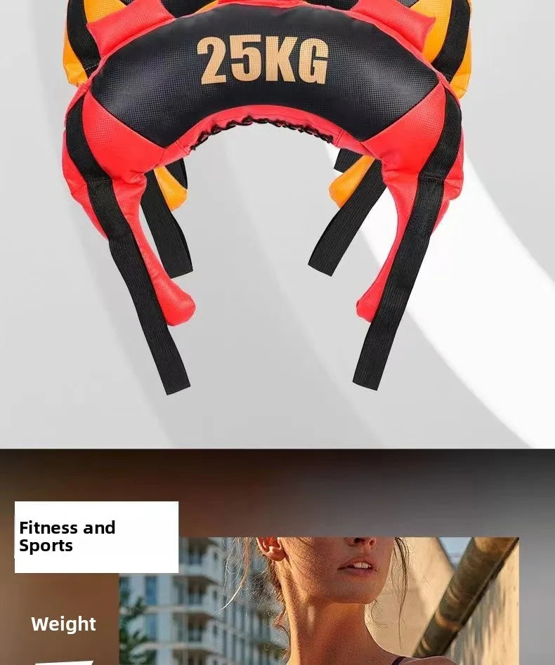 25kg curved Bulgarian training bag in red, black and orange with multiple durable fabric handles for gym workouts.