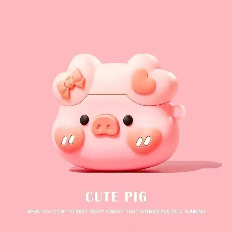 Cute pink pig-shaped silicone AirPods case with a bow and heart details. Compatible with Apple AirPods.