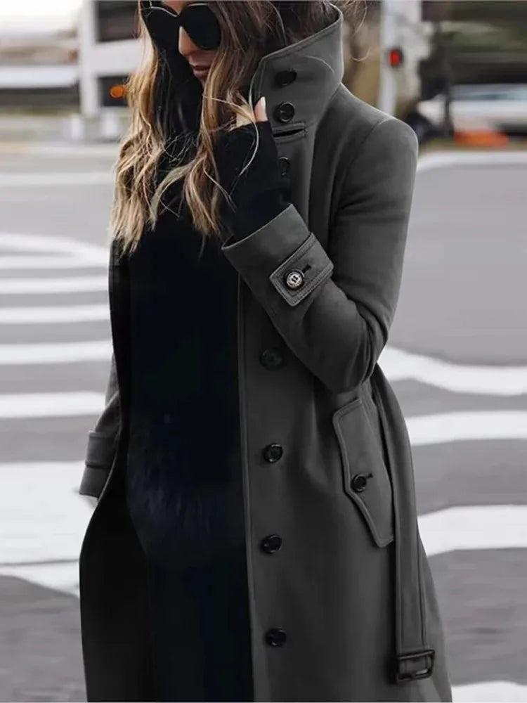 Women’s dark grey wool-blend trench coat with a high collar, button front, and cuff detailing.