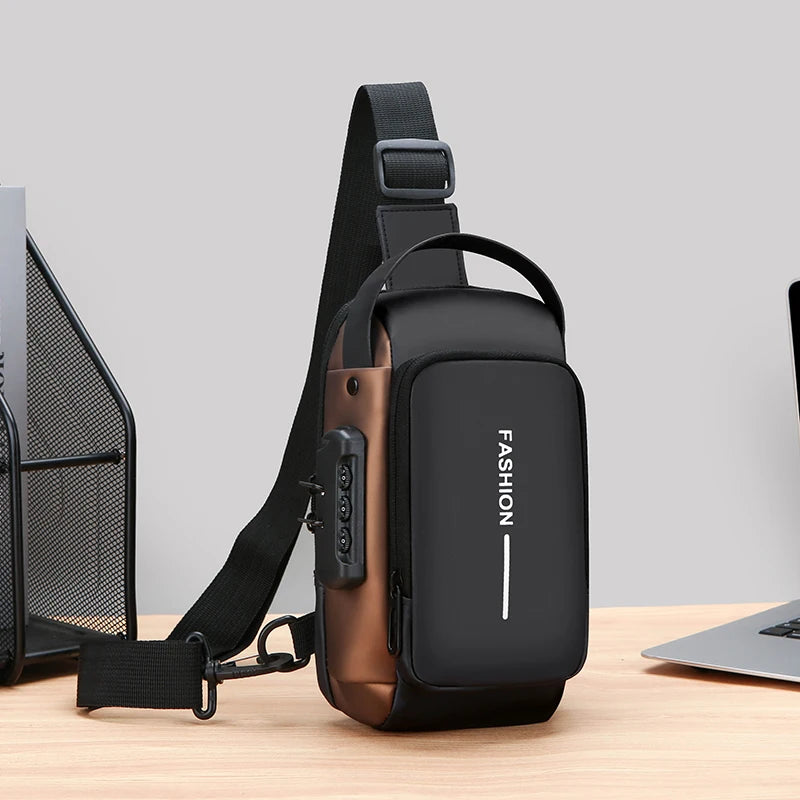Black and bronze crossbody chest bag with a combination lock, adjustable strap, and integrated USB charging port.