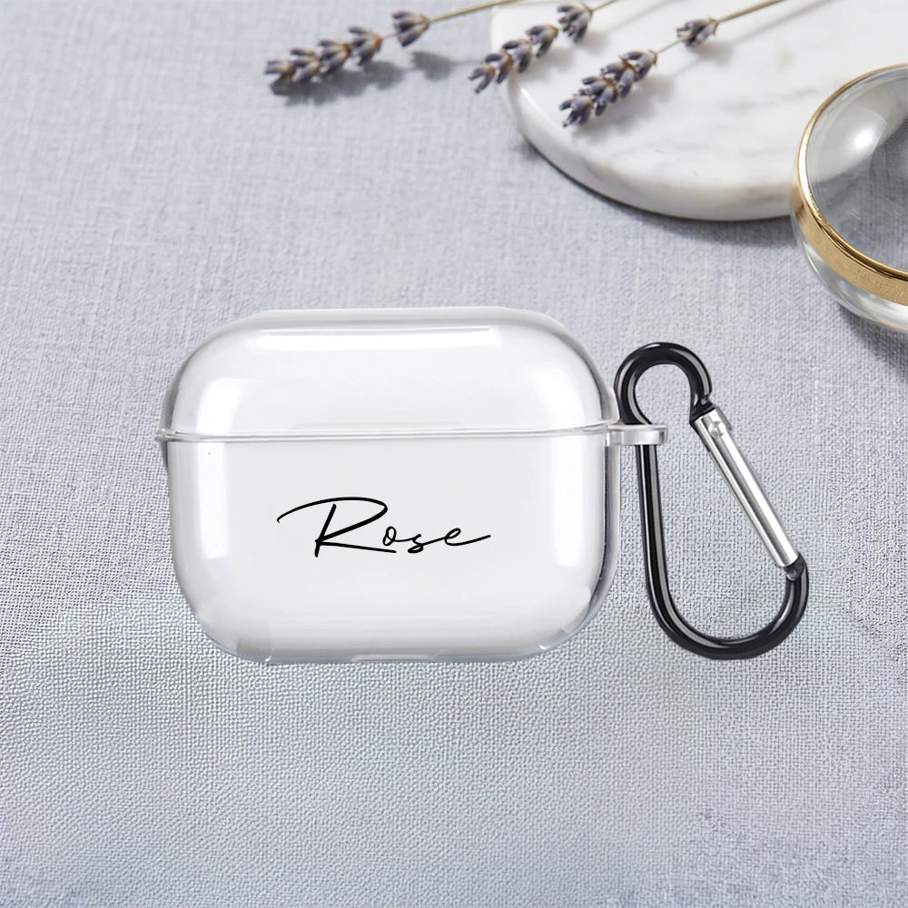 Clear plastic AirPods case personalised with 'Rose' in black script, featuring a black carabiner clip.