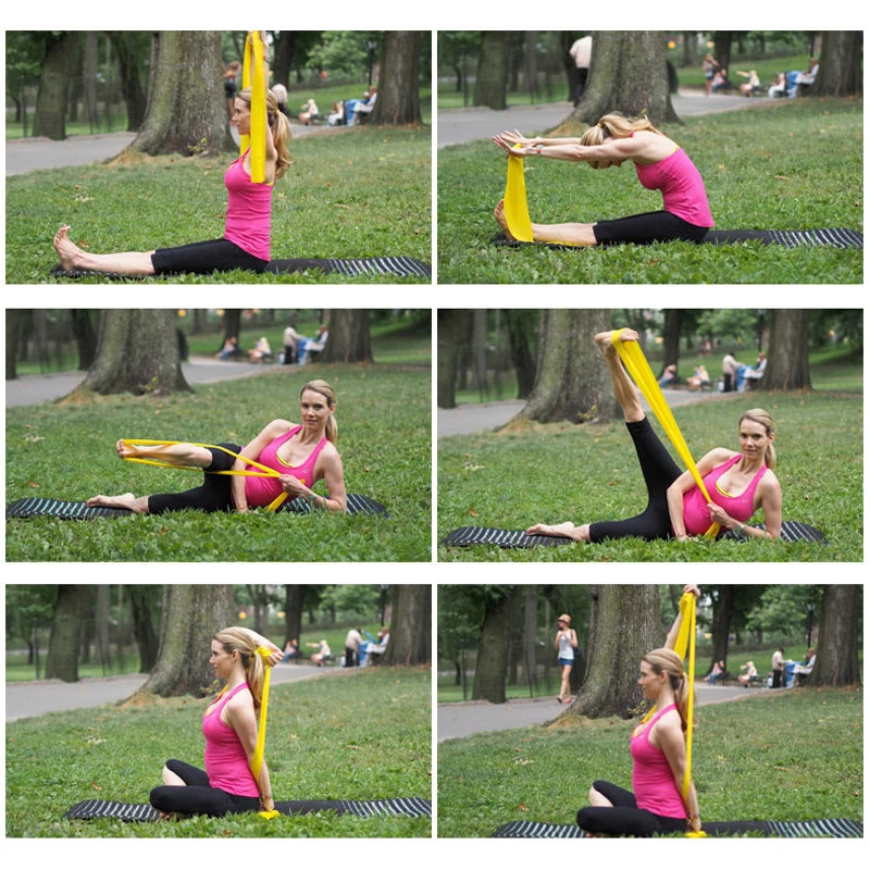 Woman in pink sportswear using a long yellow exercise resistance band for various stretches on a mat in a park.