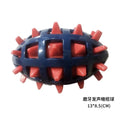 Durable navy blue rubber dog rugby ball with red spiky textured inserts for dental cleaning and play.