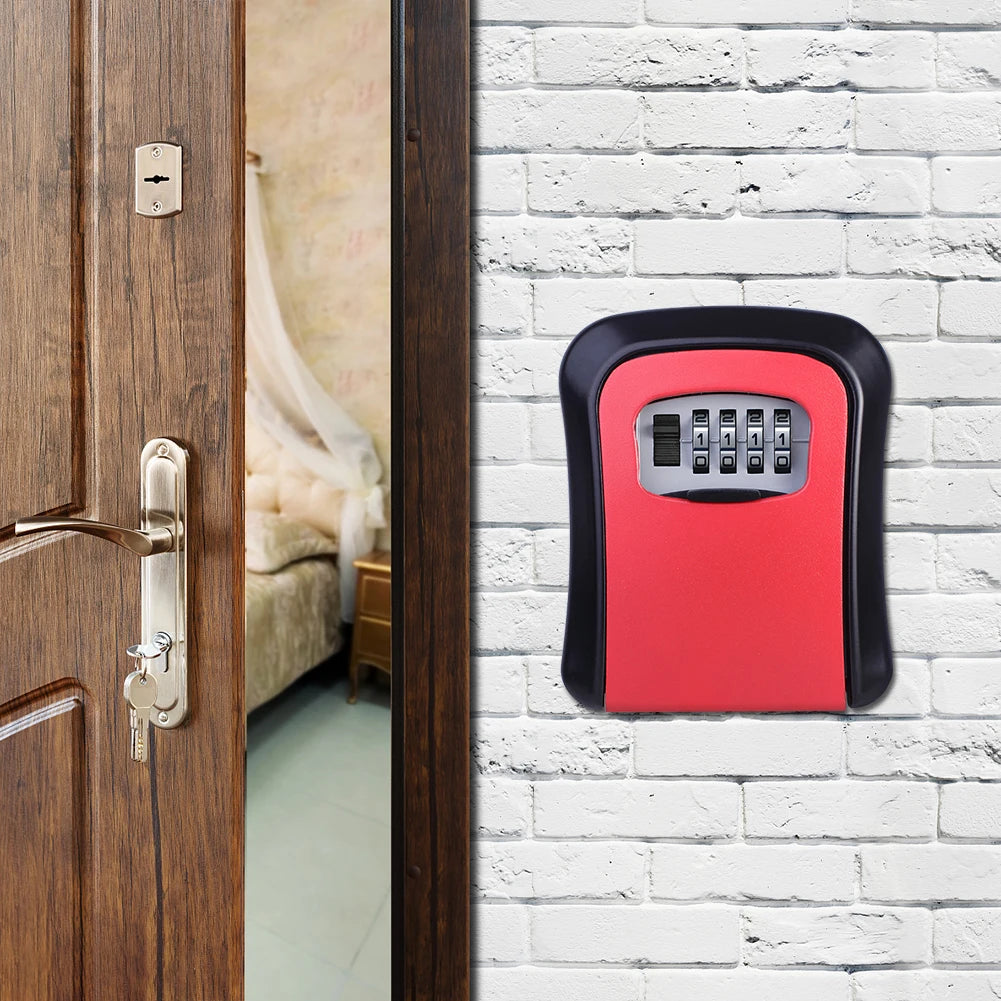 Red and black metal wall-mounted key lock box with a four-digit combination dial.