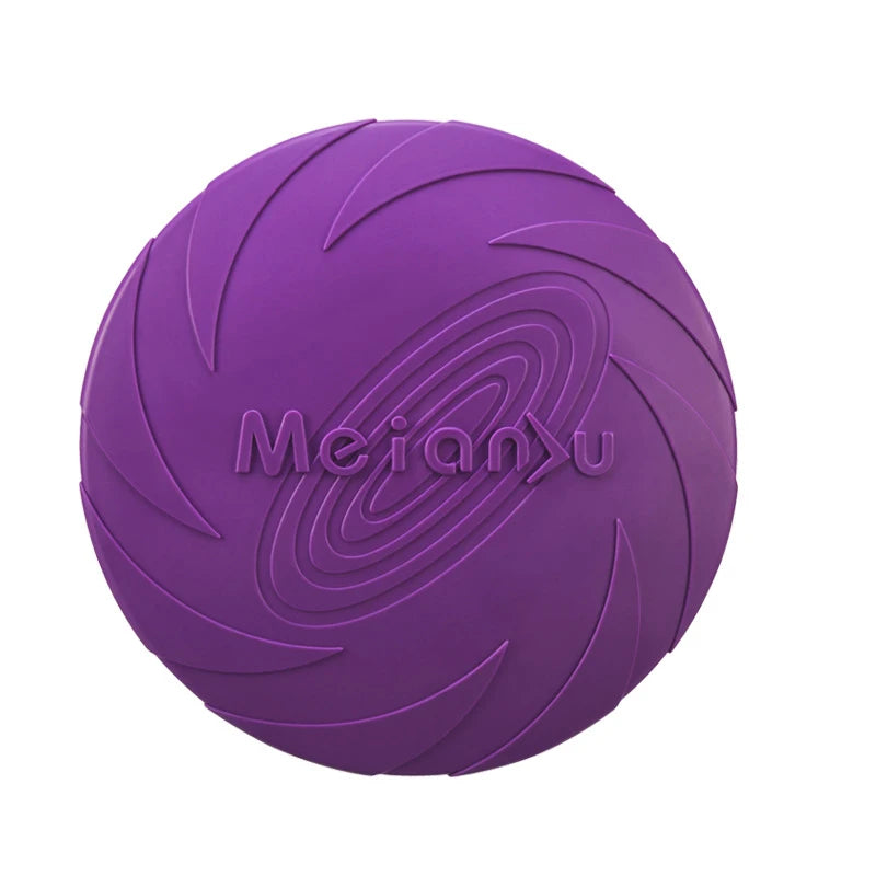 A purple silicone flying disc for dogs with a textured, spiral-patterned surface.
