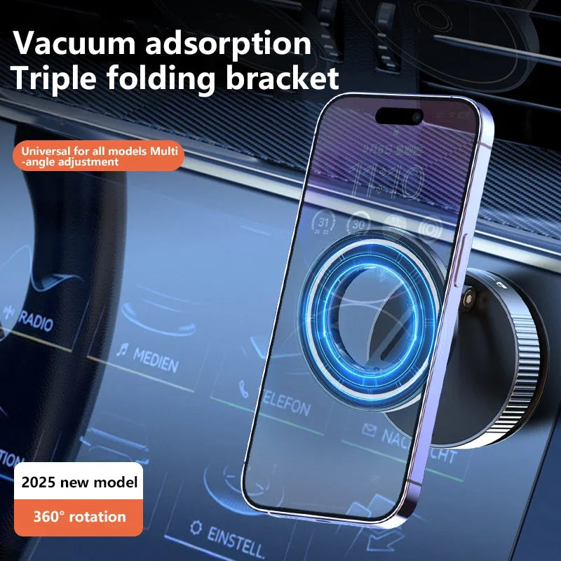 A foldable, silver circular magnetic car phone mount attached to a vehicle dashboard, holding a smartphone.