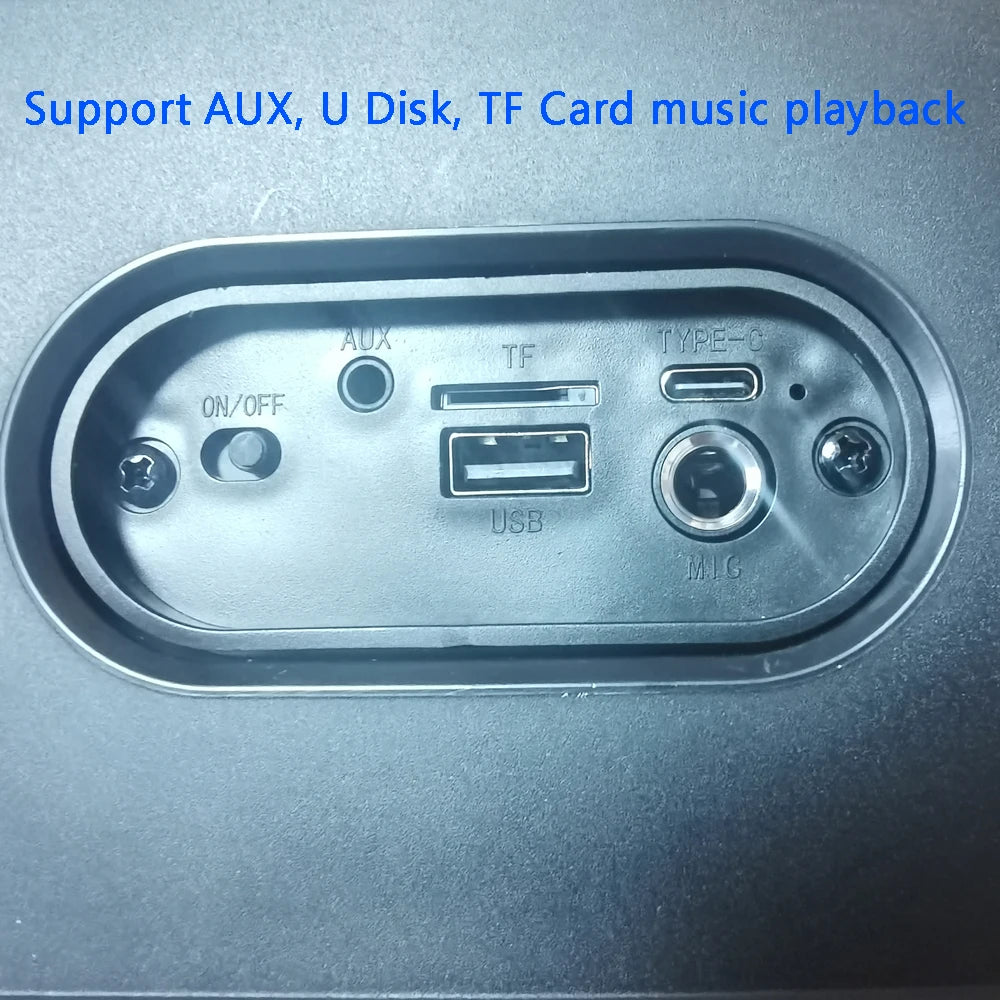 Close-up of a black karaoke speaker control panel featuring AUX, USB, TF card, Type-C charging and microphone ports.