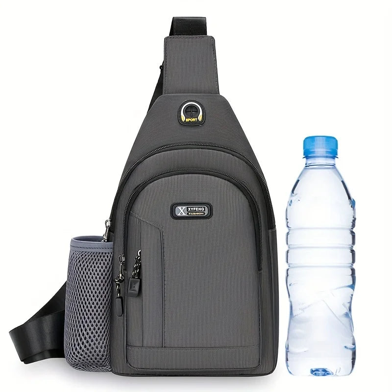 Grey men's Oxford fabric crossbody chest bag featuring a zip compartment and a convenient mesh water bottle holder.