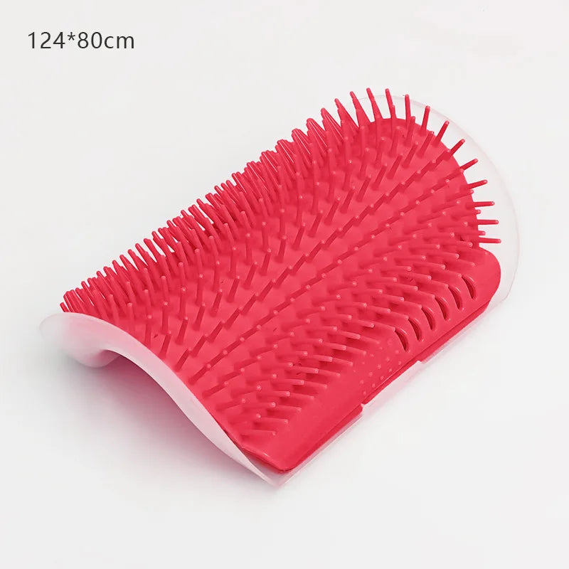 Bright pink, rectangular pet grooming brush with curved edges and stiff silicone bristles.