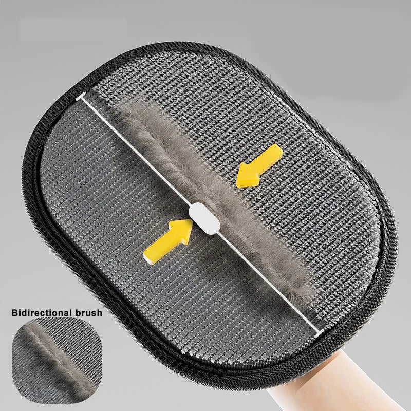 Grey oval lint brush with a central dual-directional fabric strip and yellow directional arrows on a grey background.