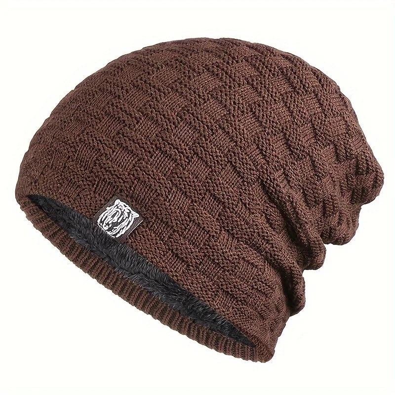 Brown knitted beanie hat with a textured pattern and a soft, black fleece-lined interior.