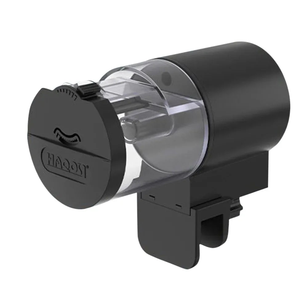 Automatic black fish tank feeder with a clear food drum and a mounting bracket, set against a plain white background.