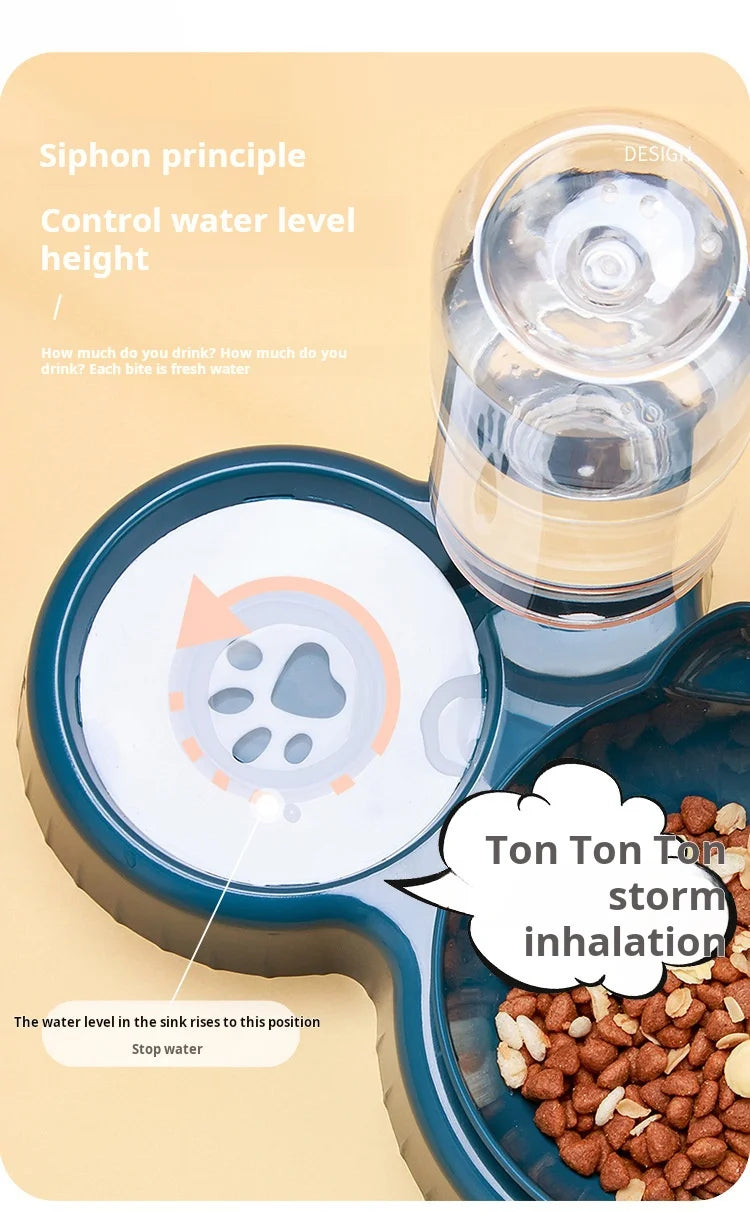 Dark teal 3-in-1 pet feeding station featuring a clear gravity water dispenser and a food bowl filled with dry kibble.